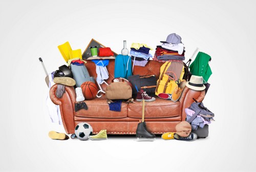 Furniture being cleared from a living room in Palmers Green